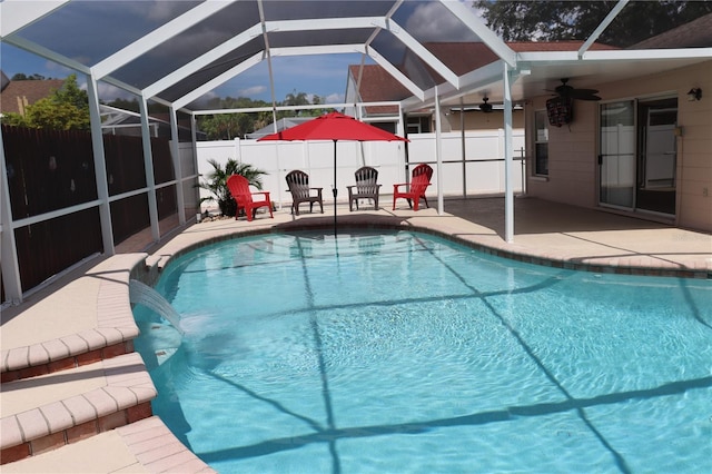 11014 Peking Pl, Tampa, FL 33624 - view of pool with a patio, ceiling fan, and glass enclosure