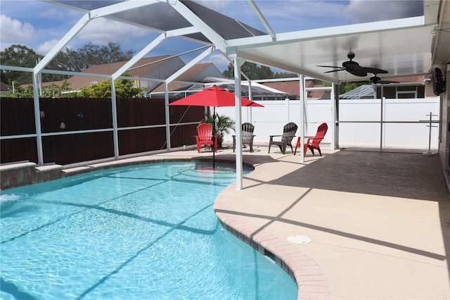 11014 Peking Pl, Tampa, FL 33624 - view of pool featuring a patio, ceiling fan, and glass enclosure