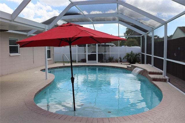 11014 Peking Pl, Tampa, FL 33624 - view of swimming pool with a patio and glass enclosure