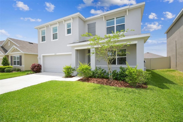 33524 Elm Hill Br, Wesley Chapel, FL 33545 - view of front facade with stucco siding, a garage, and concrete driveway