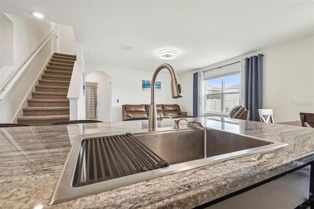 33524 Elm Hill Br, Wesley Chapel, FL 33545 - kitchen view of a sink and arched walkways
