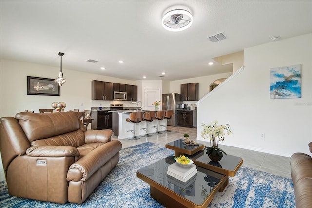33524 Elm Hill Br, Wesley Chapel, FL 33545 - living area featuring light tile patterned floors and recessed lighting