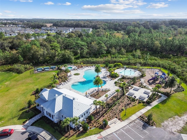 33524 Elm Hill Br, Wesley Chapel, FL 33545 - bird's eye view of a pool area and a forest