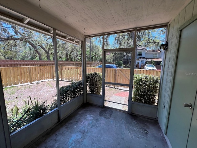 14725 Morning Dr, Lutz, FL 33559 - unfurnished sunroom featuring plenty of natural light