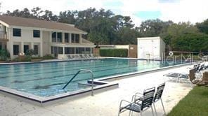 14725 Morning Dr, Lutz, FL 33559 - community pool with a patio