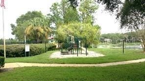 14725 Morning Dr, Lutz, FL 33559 - view of community featuring a lawn