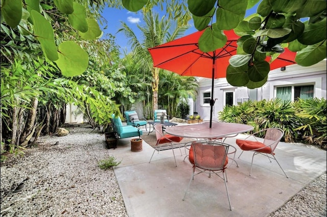1210 Bay Palm Blvd, Indian Rocks Beach, FL 33785 - view of patio / terrace with outdoor dining area