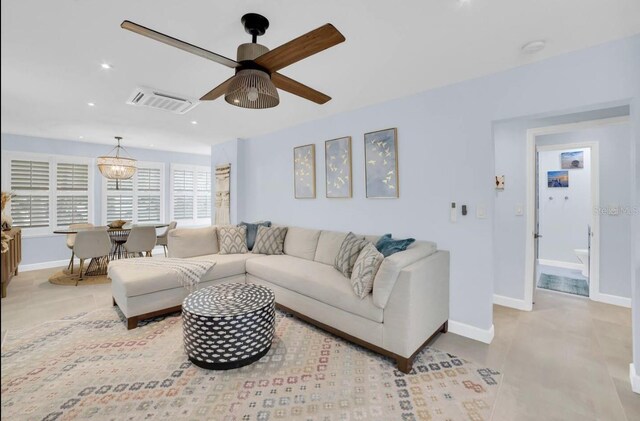 1210 Bay Palm Blvd, Indian Rocks Beach, FL 33785 - living area featuring baseboards, ceiling fan, and recessed lighting