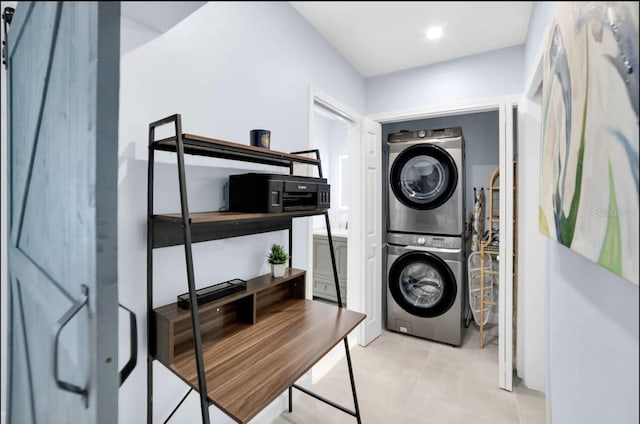 1210 Bay Palm Blvd, Indian Rocks Beach, FL 33785 - laundry room featuring estacked washer and dryer and tile patterned floors