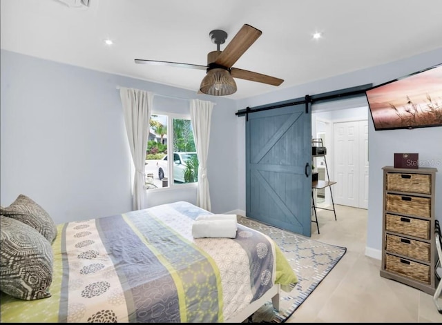 1210 Bay Palm Blvd, Indian Rocks Beach, FL 33785 - bedroom with a barn door, recessed lighting, and a ceiling fan