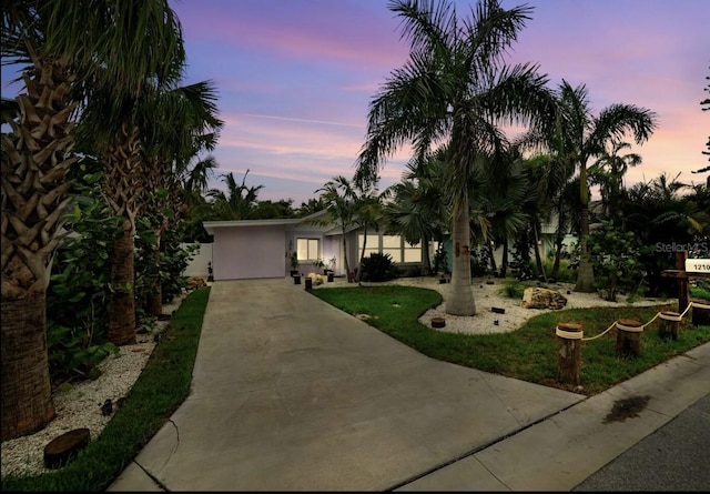 1210 Bay Palm Blvd, Indian Rocks Beach, FL 33785 - view of front facade featuring driveway