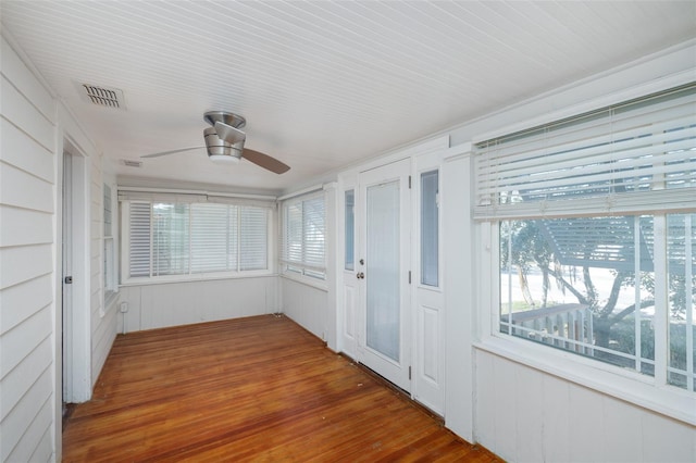 3108 Dupont St S, Gulfport, FL 33707 - unfurnished sunroom with wood finished floors