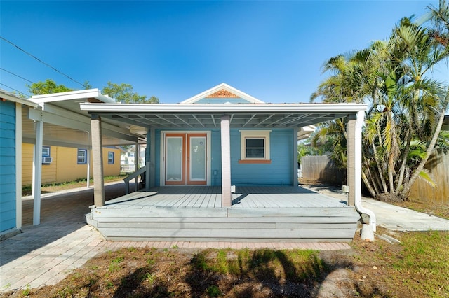 3108 Dupont St S, Gulfport, FL 33707 - rear view of property featuring fence