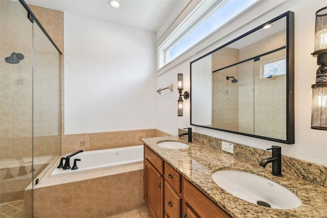 407 S Fremont Ave Unit B, Tampa, FL 33606 - full bath featuring a shower stall, a garden tub, double vanity, tile patterned floors, and recessed lighting