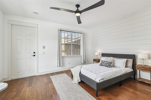 407 S Fremont Ave Unit B, Tampa, FL 33606 - bedroom with wood finished floors, a ceiling fan, and baseboards