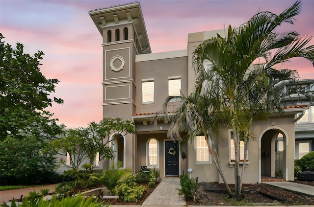 407 S Fremont Ave Unit B, Tampa, FL 33606 - view of front of house with stucco siding and a tiled roof