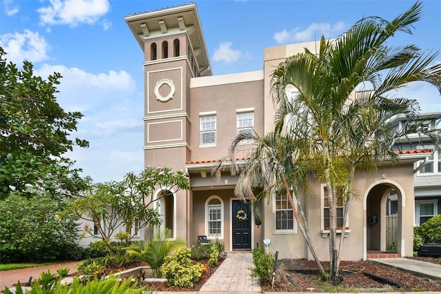 407 S Fremont Ave Unit B, Tampa, FL 33606 - view of front of house featuring stucco siding and a tiled roof