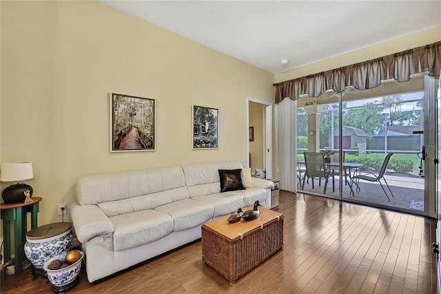 12012 Cromwell Way, Spring Hill, FL 34609 - living room featuring wood finished floors