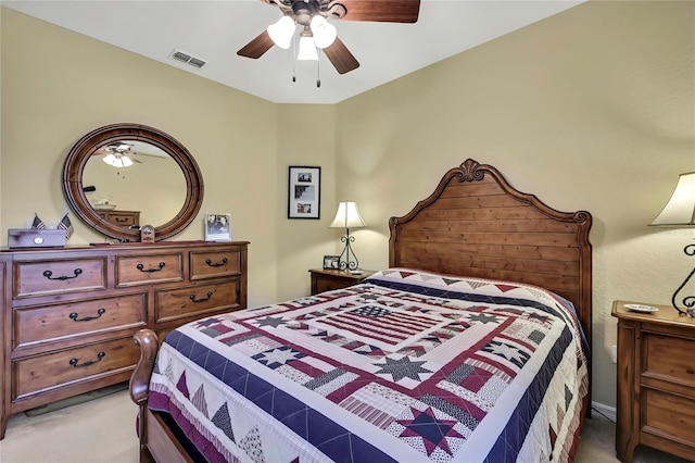 12012 Cromwell Way, Spring Hill, FL 34609 - bedroom with light colored carpet and a ceiling fan