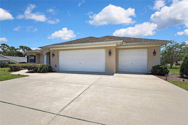 12012 Cromwell Way, Spring Hill, FL 34609 - view of front of home featuring stucco siding, a garage, and concrete driveway