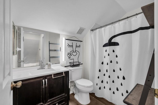 5865 Meadowpark Pl, Lithia, FL 33547 - full bathroom with vaulted ceiling, wood finished floors, toilet, vanity, and a shower with shower curtain