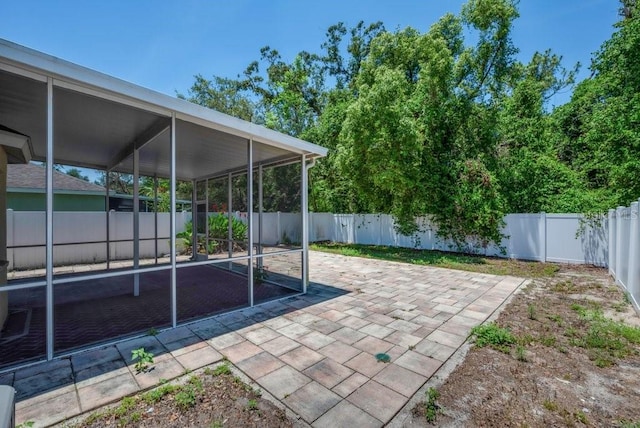 5865 Meadowpark Pl, Lithia, FL 33547 - fenced backyard featuring a patio area