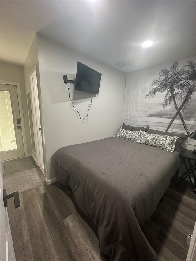1459 Joel Ln, Clearwater, FL 33755 - bedroom featuring wood finished floors and baseboards
