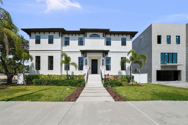 403 E Davis Blvd, Tampa, FL 33606 - view of front of property featuring stucco siding and a front yard