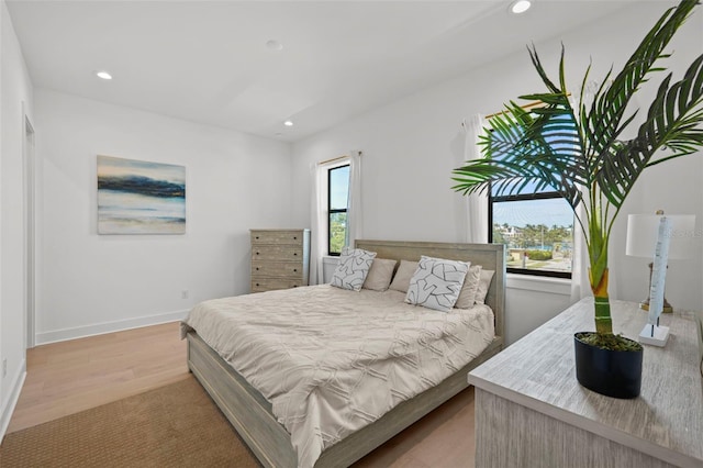 403 E Davis Blvd, Tampa, FL 33606 - bedroom featuring recessed lighting, light wood-type flooring, and baseboards