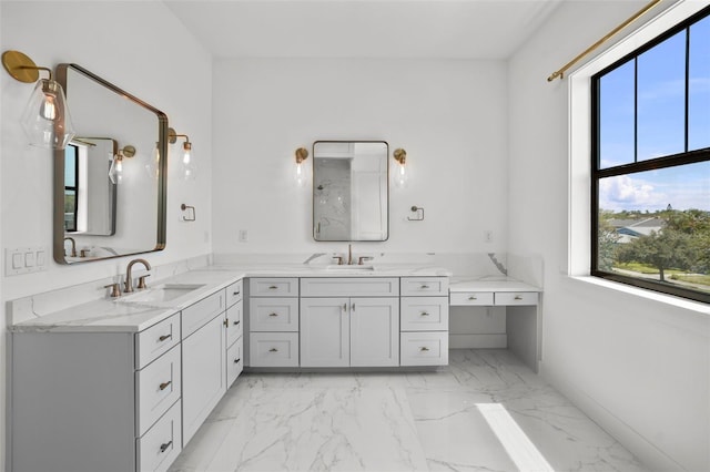 403 E Davis Blvd, Tampa, FL 33606 - full bath with marble finish floors, healthy amount of natural light, vanity, and baseboards