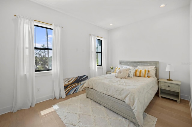 403 E Davis Blvd, Tampa, FL 33606 - bedroom with multiple windows, wood finished floors, recessed lighting, and baseboards