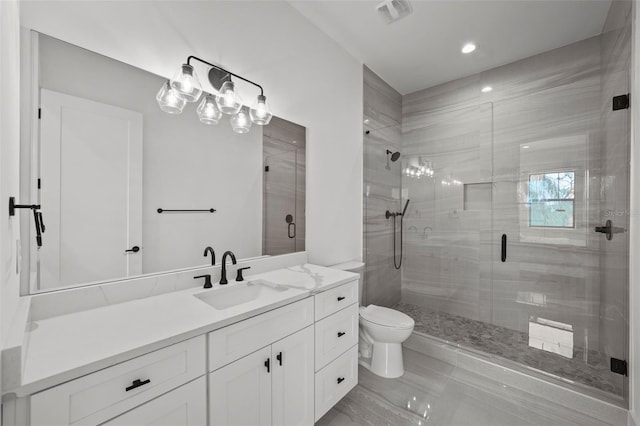403 E Davis Blvd, Tampa, FL 33606 - full bath featuring a shower stall, toilet, vanity, and recessed lighting