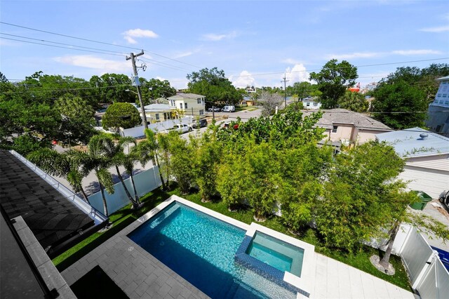 403 E Davis Blvd, Tampa, FL 33606 - view of swimming pool with a pool with connected hot tub and a fenced backyard