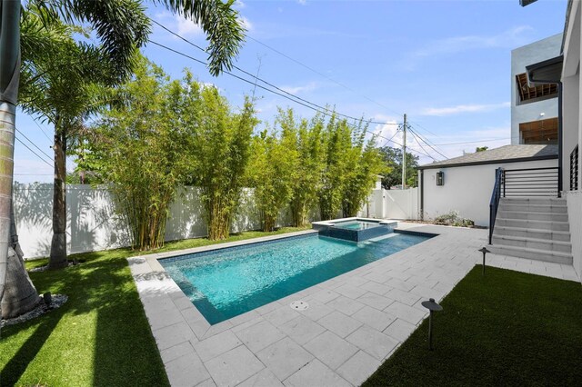 403 E Davis Blvd, Tampa, FL 33606 - view of pool with a patio and a pool with connected hot tub
