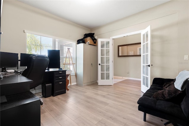4917 Eagle Rock Dr, Wimauma, FL 33598 - office area featuring french doors, light wood-type flooring, and baseboards