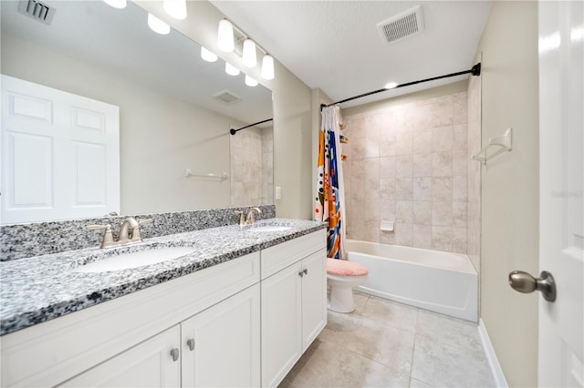 4917 Eagle Rock Dr, Wimauma, FL 33598 - full bath with tile patterned flooring, shower / bathtub combination with curtain, toilet, double vanity, and baseboards