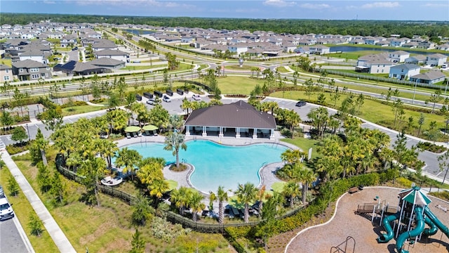 4917 Eagle Rock Dr, Wimauma, FL 33598 - view of property location with a pool area and nearby suburban area