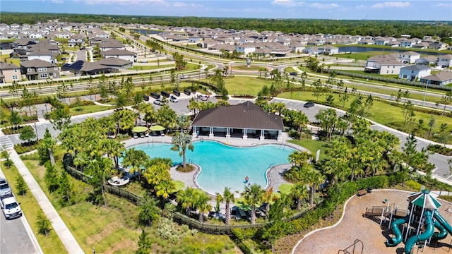4917 Eagle Rock Dr, Wimauma, FL 33598 - aerial perspective of suburban area with a pool