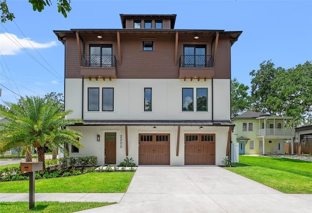 2200 N Glenwood Dr, Tampa, FL 33602 - view of front of house with concrete driveway, a balcony, and a standing seam roof
