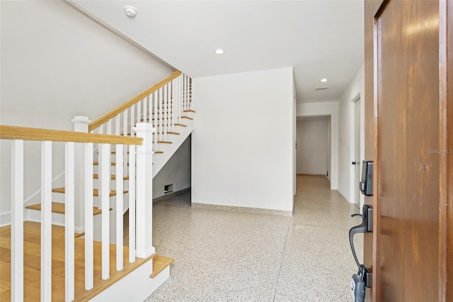 2200 N Glenwood Dr, Tampa, FL 33602 - entryway with stairs, speckle patterned floor, baseboards, and recessed lighting