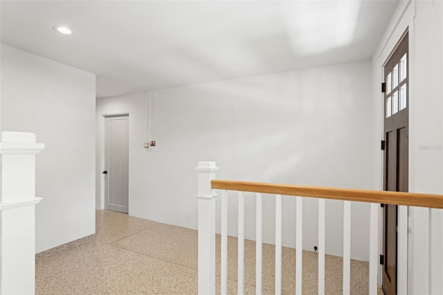 2200 N Glenwood Dr, Tampa, FL 33602 - hallway with speckled floor, an upstairs landing, and recessed lighting