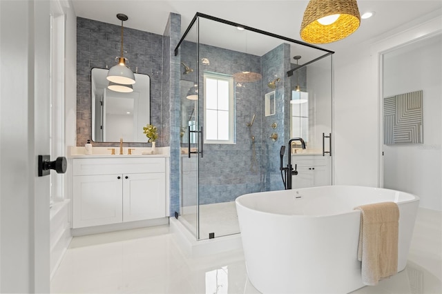 2200 N Glenwood Dr, Tampa, FL 33602 - bathroom featuring a freestanding bath, vanity, a shower stall, and tile patterned flooring
