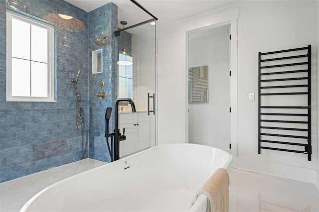 2200 N Glenwood Dr, Tampa, FL 33602 - full bathroom with plenty of natural light, a tile shower, a soaking tub, and a sink