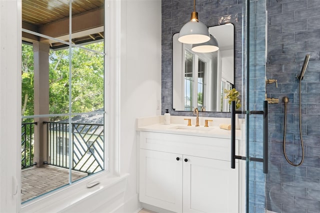 2200 N Glenwood Dr, Tampa, FL 33602 - full bath featuring vanity, plenty of natural light, and a tile shower