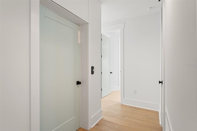 2200 N Glenwood Dr, Tampa, FL 33602 - corridor featuring light wood-style flooring and baseboards