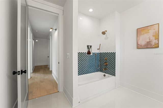 2200 N Glenwood Dr, Tampa, FL 33602 - full bathroom with baseboards, shower / bathtub combination, and tile patterned flooring