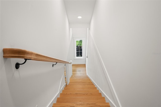 2200 N Glenwood Dr, Tampa, FL 33602 - stairway with wood finished floors and recessed lighting