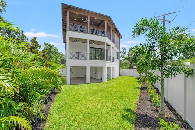 2200 N Glenwood Dr, Tampa, FL 33602 - rear view of property featuring a balcony, a ceiling fan, and a patio