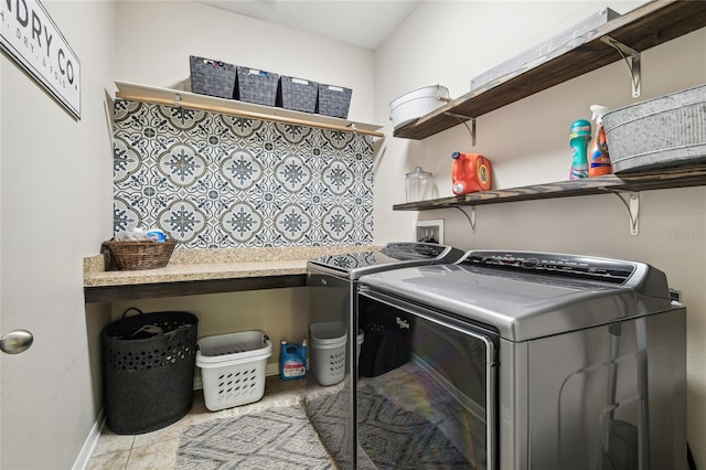 3530 Brook Crossing Dr, Brandon, FL 33511 - washroom featuring washer and dryer, baseboards, and light tile patterned flooring