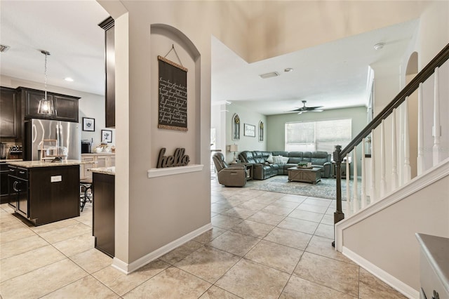 3530 Brook Crossing Dr, Brandon, FL 33511 - hall with light tile patterned floors, baseboards, recessed lighting, and stairs
